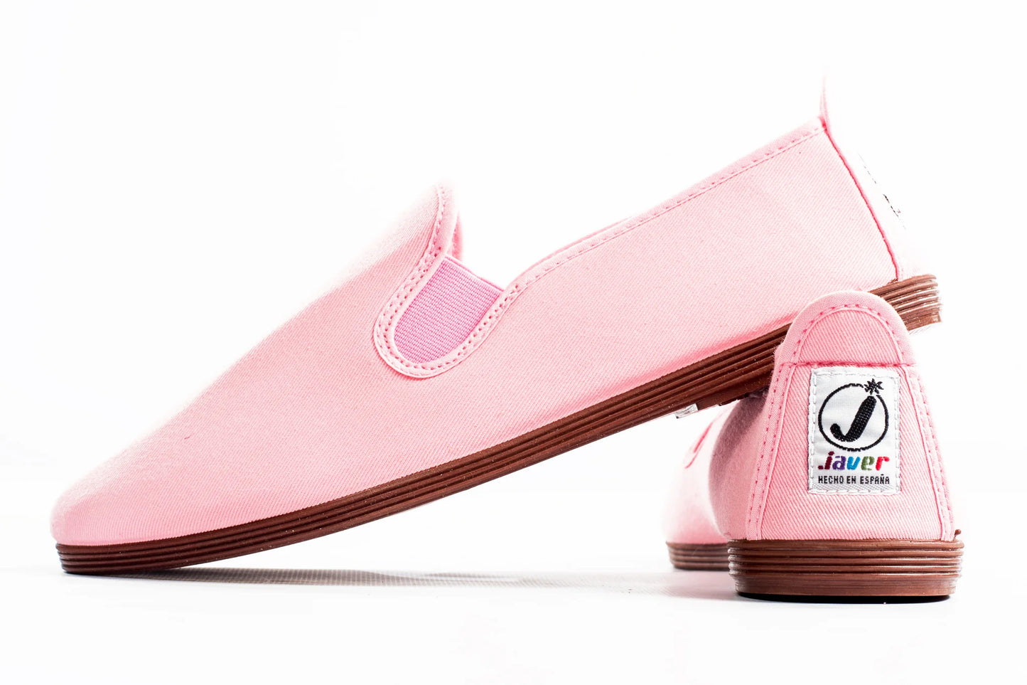 Javer Pink slip-on shoes with a visible brand logo on a white background