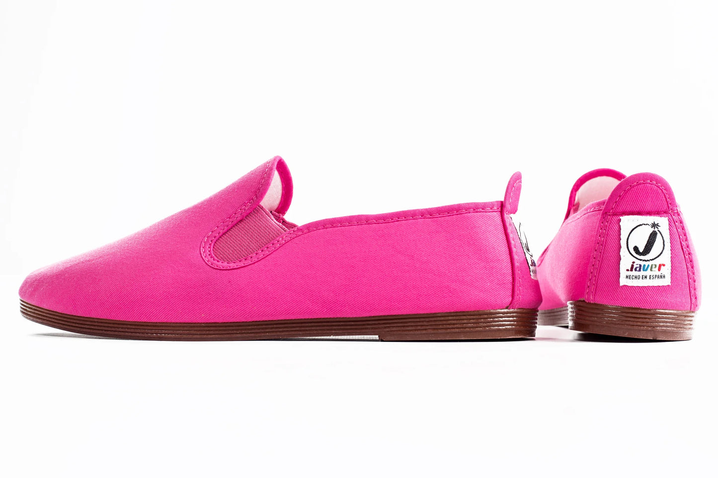 Javer Pink slip-on shoes with a visible brand logo on a white background
