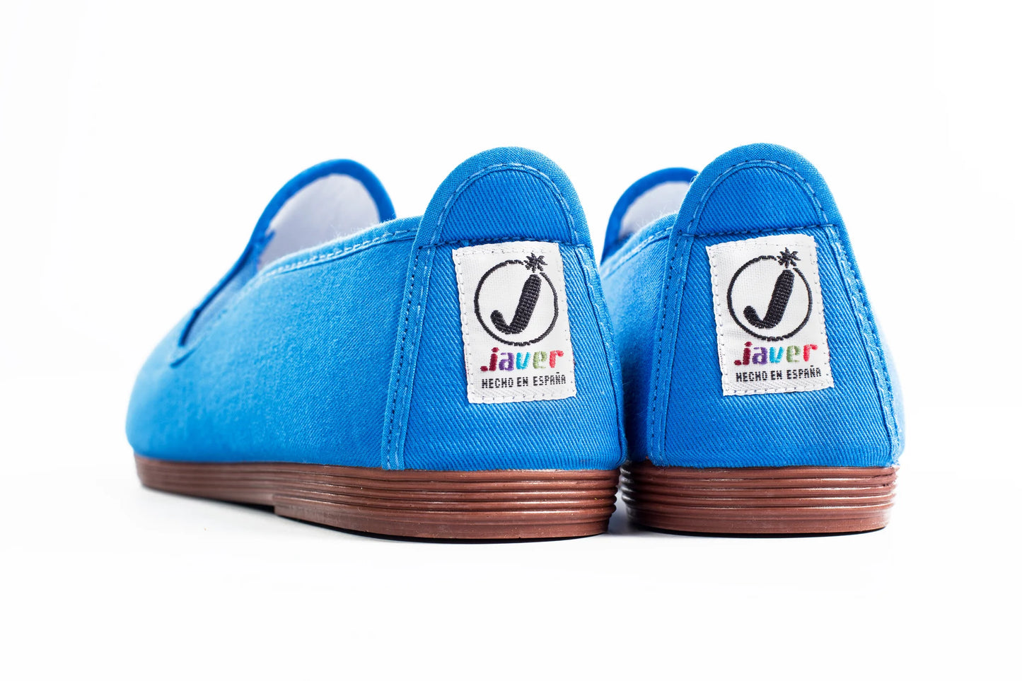 Javer Blue slip-on shoes with a visible brand logo on a white background
