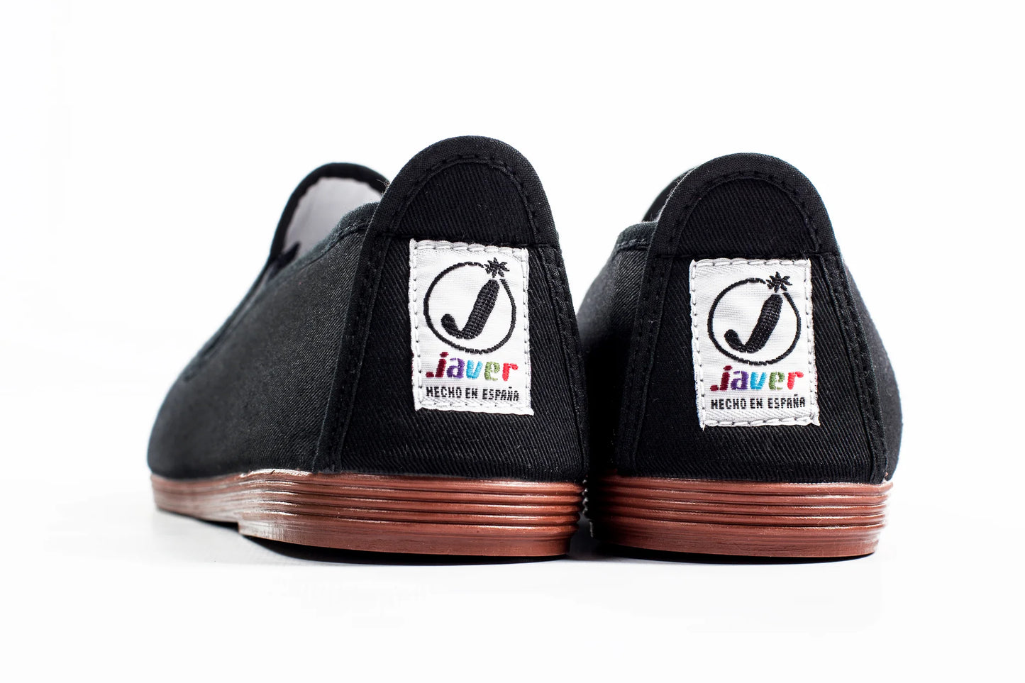 Javer Black shoes with 'Javer' logo on the sole against a white background
