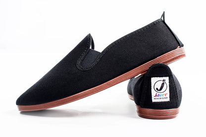 Javer Black loafers with brown soles on a white background, featuring the Javer brand logo.