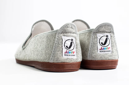 Javer Pair of gray shoes with brown soles on a white background, featuring the Javer logo.
