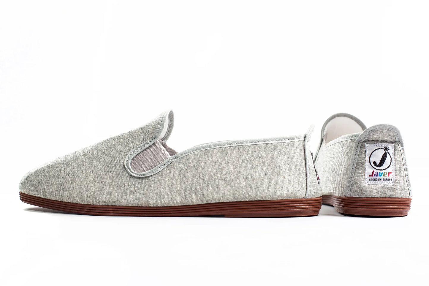 Javer Pair of gray slippers with a visible brand logo on a white background