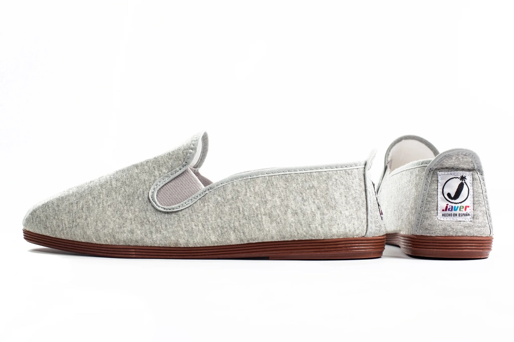 Javer Pair of gray slippers with a visible brand logo on a white background