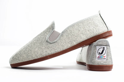 Javer Gray slip-on shoes with brown soles on a white background