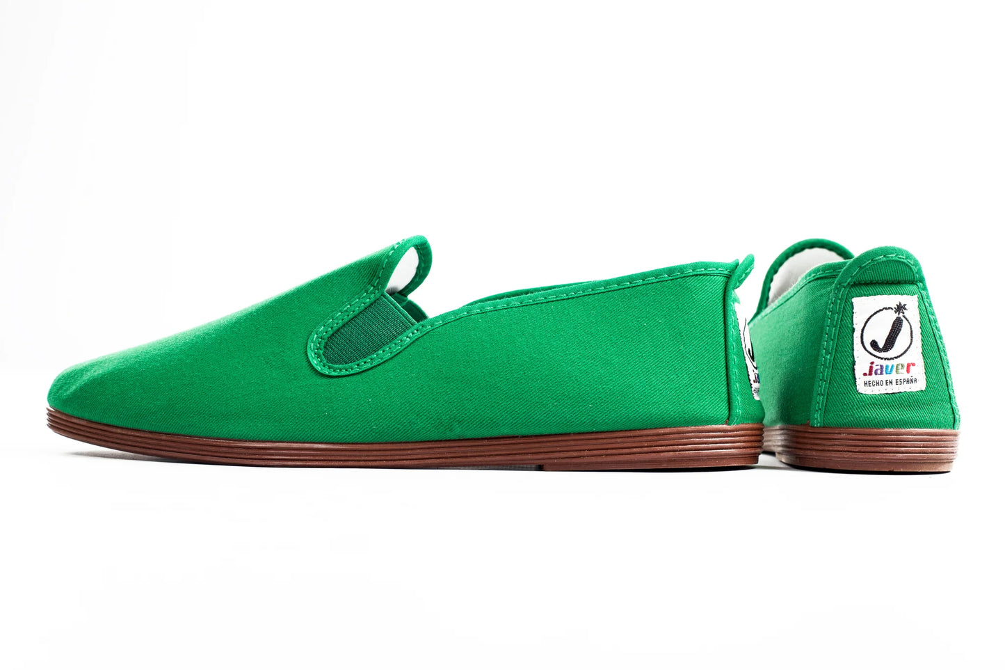 Javer Green slip-on shoe with brown sole on a white background