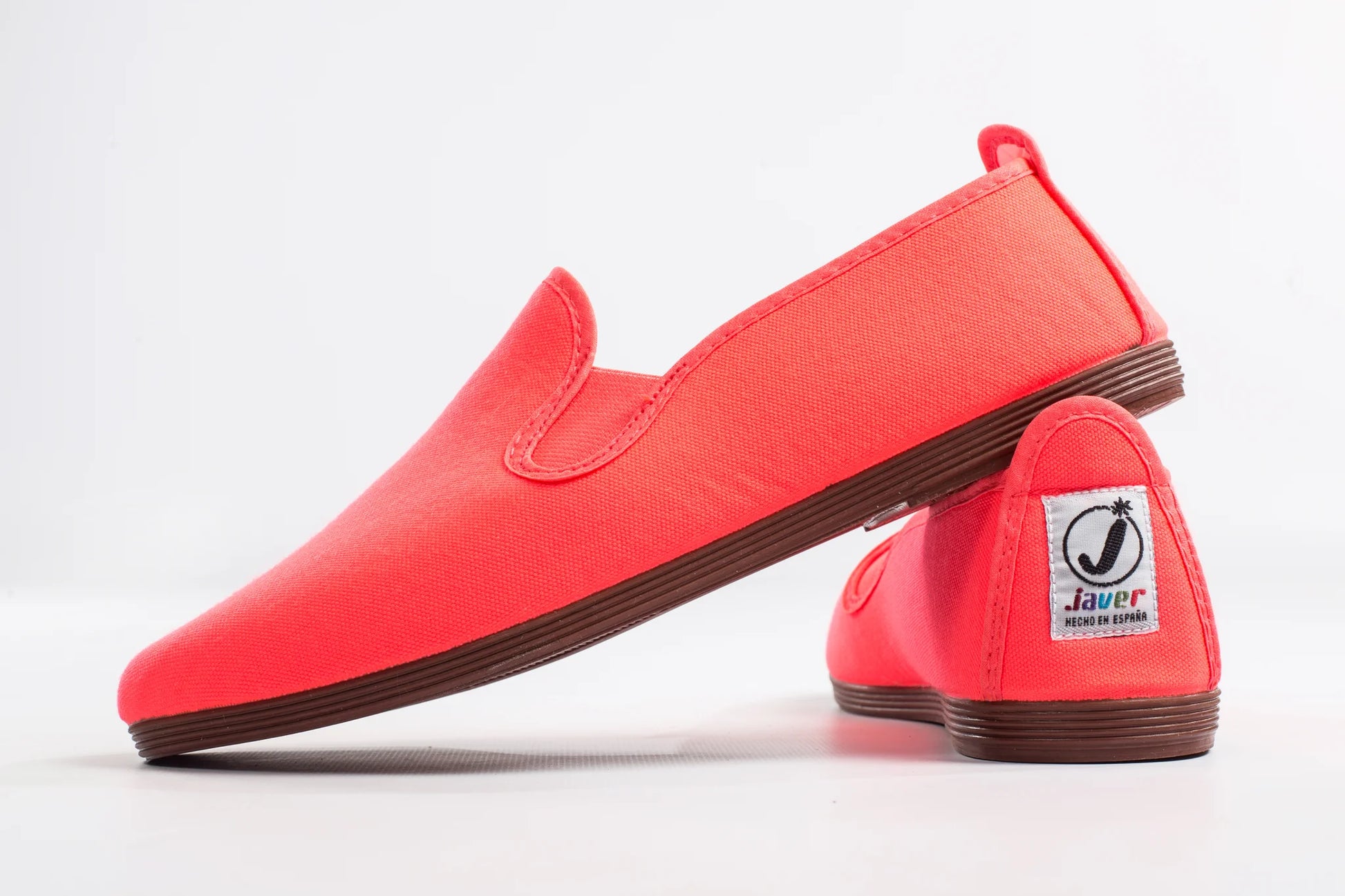 Javer Red slip-on shoes with a brand logo on a white background