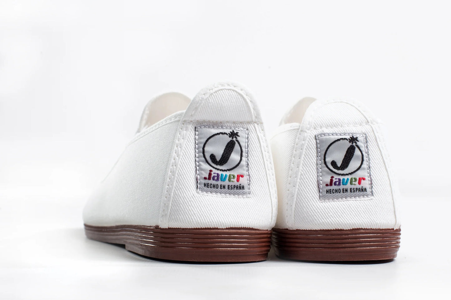 Javer White sneakers with brown soles and 'Javer' logo on a white background