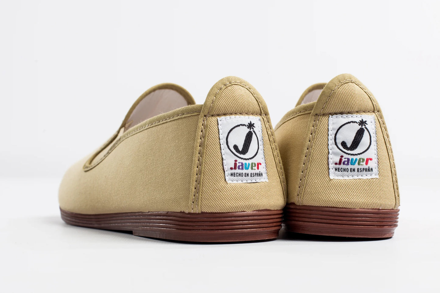 Javer Beige slip-on shoes with 'Javer' logo on a white background