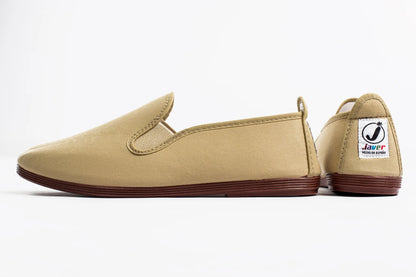 Javer Beige slip-on shoes with a visible brand logo on a white background