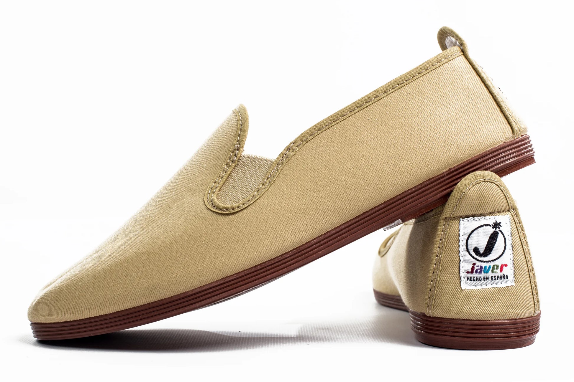 Javer Beige loafers with brown soles on a white background, featuring a visible brand label.